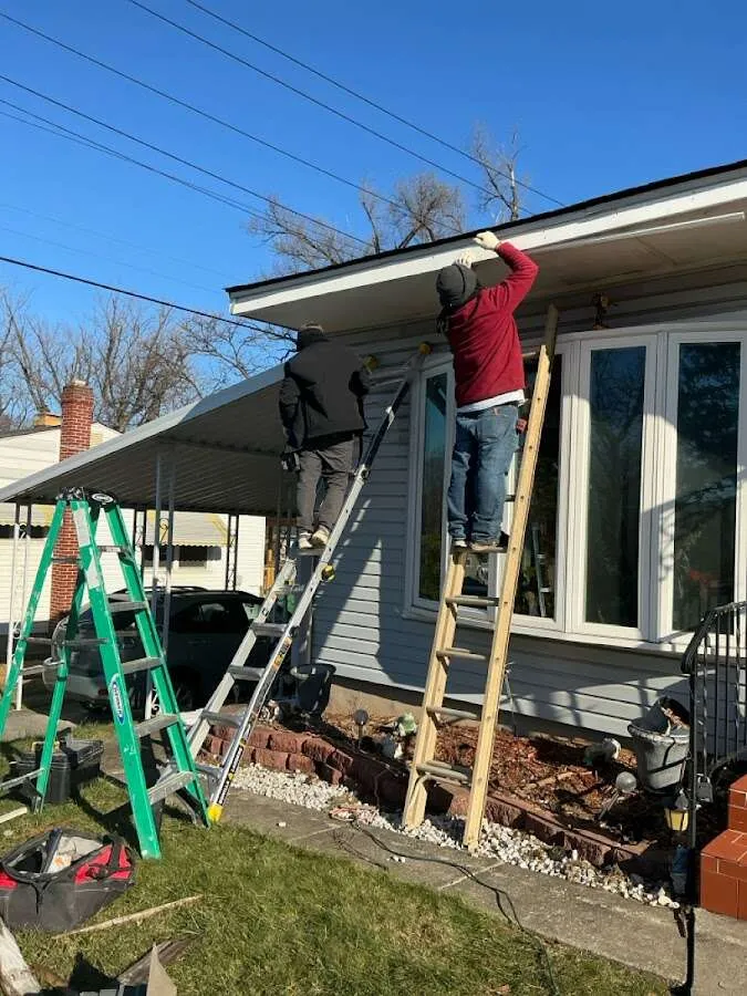 Restoration crew performing exterior repair in Sandy