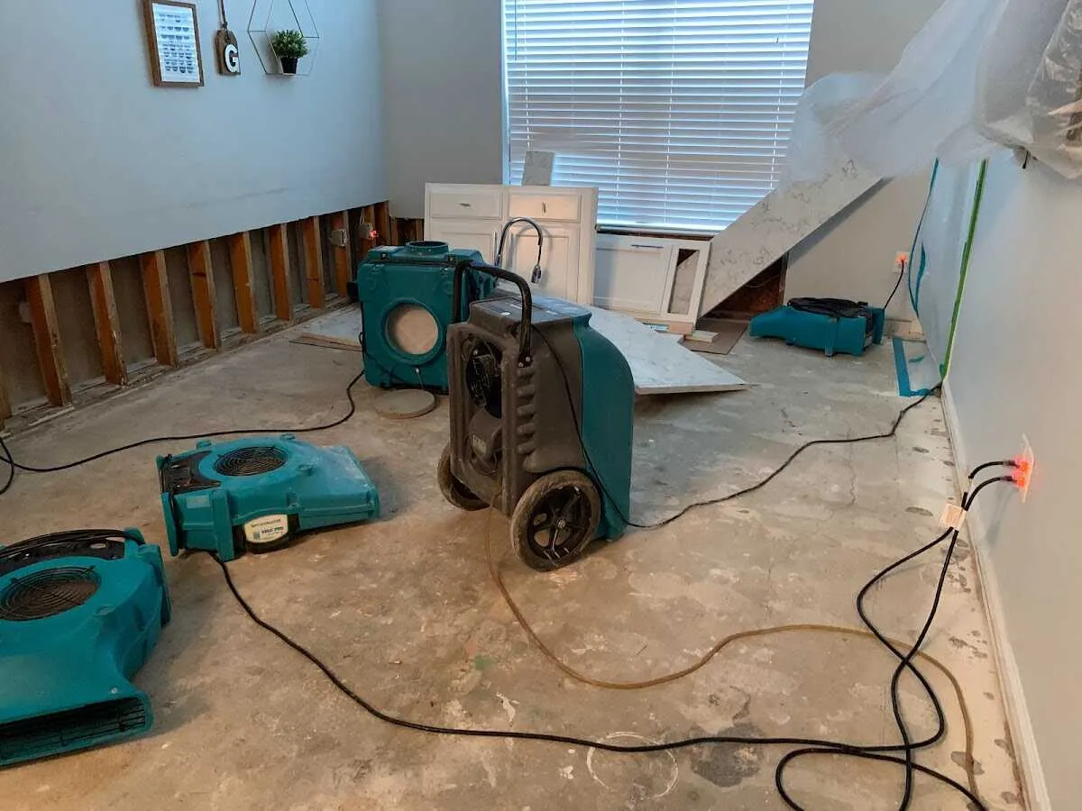 Dehumidifier in flood-cut room for Water Damage Restoration in Sandy